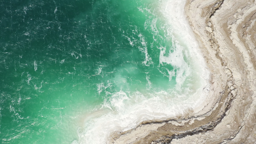 Aerial view of Dead Sea over the sea shore of Jordan, | Shutterstock HD Video #1047171784