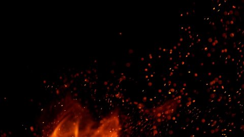 Super slow motion of fire sparks isolated on black background. Filmed on high speed camera, 1000 fps