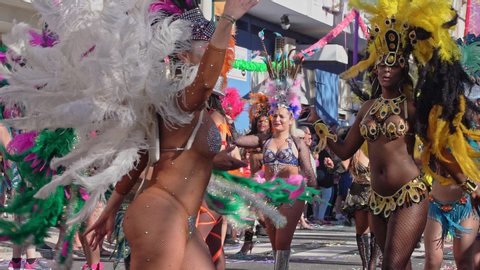 Portugal, Algarve, Loule 2020 - February 23. Beautiful girls dance samba at the Portuguese carnival during the parade.
