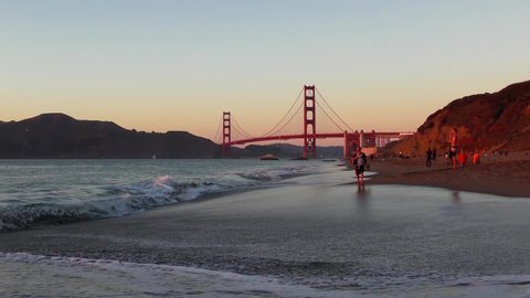 The Golden Gate Bridge as seen from Baker Beach at sunset, San Francisco, California, USA, 2018