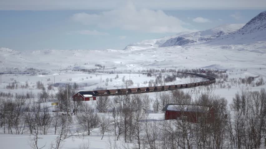 The train in the mountains.The train in the winter mountains.Mountains, train, winter.Winter, skiing, mountain.Passing train in snowy mountains.Skiing, winter, train.