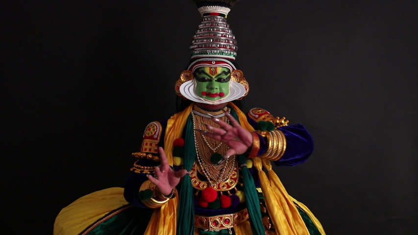 Kathakali dancer depicting an emotion with his gestures. Royalty-Free Stock Footage #1047266128