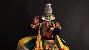 Kathakali dancer depicting an emotion with his movements.