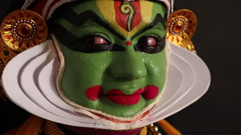 Close up of a Kathakali dancer representing Sringara through his eyes.