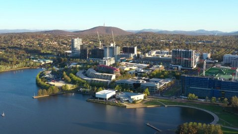 Aerial view of Belconnen Town Centre over Lake Ginninderra during a sunny late afternoon in Canberra, the capital of Australia 