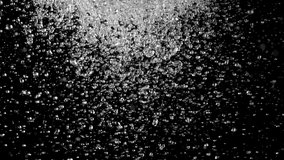 Water splashing on black background, super slow motion. Filmed on high speed cinema camera, 1000 fps.