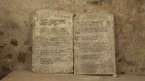 Ten Commandments from the Bible which God tells Moses to write on Tablets of stone. Slow Zoom in - Stock Video Clip Footage
