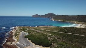 4K summer day aerial drone video: spectacular Bordjiesrif beach at Vasco Da Gama Cross. Cape of Good Hope, most popular tourist attraction, near Cape Town in Cape Peninsula, Western Cape, South Africa