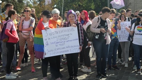 KHARKIV, UKRAINE - September 15, 2019: People wave LGBTQ gay pride flags