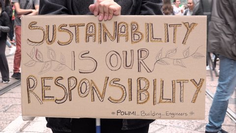 MILAN, ITALY - SEPTEMBER 27, 2019 Protest sign for global strike for climate. Friday for future, Greta Thunberg environmental movement, placard of conservationism SUSTAINABILITY IS OUR RESPONSIBILITY