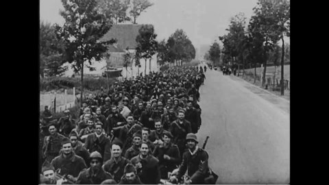 CIRCA 1940 - Allied POWs are marched after the Battle of Dunkirk.