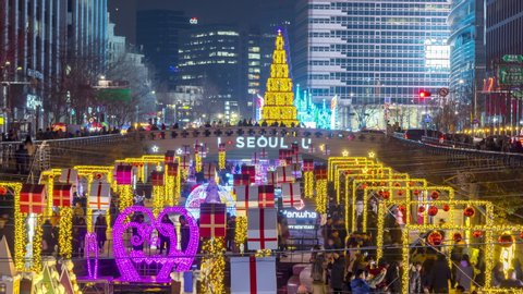 SEOUL, SOUTH KOREA - DECEMBER 15, 2018 : Time lapse Tourists visiting Cheonggyecheon stream With christmas lights in Seoul City,South Korea

