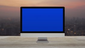 Statistics graphs, charts and diagrams data on modern computer monitor screen on wooden table over blur of cityscape on warm light sundown, Business financial intro motion background - Powered by Shutterstock - Get 15% off with code: PIKWIZARD15