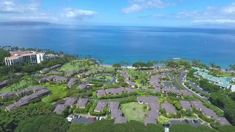 Wailea Makena , Hawaii / United States - 01 02 2020: Wailea Elua Village aerial tracking shot during sunny day.