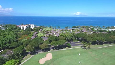 Wailea Makena , Hawaii / United States - 01 02 2020: Slow orbit reveal shot of Wailea Elua Village in Hawaii USA during beautiful day.