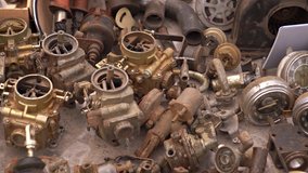 Spare parts for vintage cars. Carburetors. beeps. small motors and others. 4k video