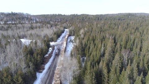 Aerial Forestry Logging Truck Driving Load - Northern Ontario Canada
