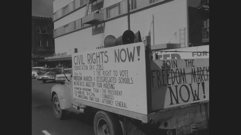 CIRCA 1960s - A truck with a loudspeaker is driven and A. Phillip Randolph gives a speech about the March on Washington for Jobs and Freedom.