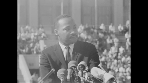 CIRCA 1964 - At the Chicago Freedom Movement rally at Soldier Field, Martin Luther King speaks on the nature of suffering and brotherhood.