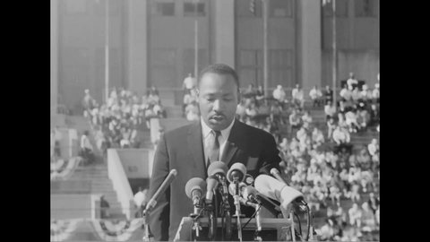 CIRCA 1964 - At the Chicago Freedom Movement rally at Soldier Field, Martin Luther King says that poor blacks and whites must unite to advance change.