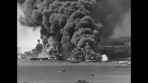 CIRCA 1941 - Captured Japanese newsreel footage shows the attack on Pearl Harbor.