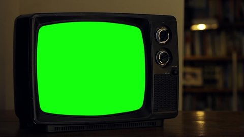 Old TV Set with Green Screen. Zoom In. Night Tone. You can Replace Green Screen with the Footage or Picture you Want with “Keying” effect in After Effects (check out tutorials on YouTube). 