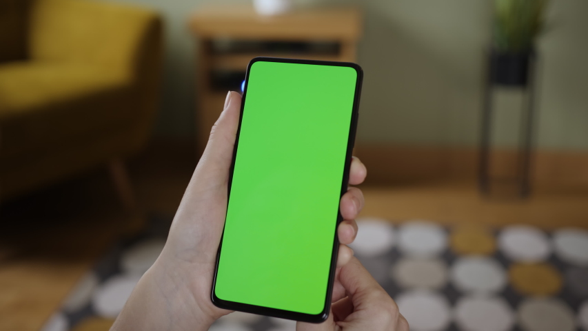 Woman Scanning Fingerprint on smartphone with Green Mock-up Screen, Doing Swiping, Scrolling Gestures. Female Mobile Phone, Internet Social. Scan Fingerprint Biometric Identity Approval. Security  | Shutterstock HD Video #1047443869