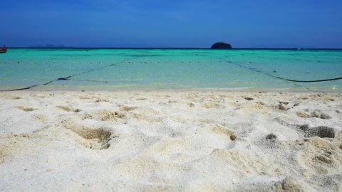 Close up sand beach and beautiful nature scenery landscape tropical sea in summer vacation.