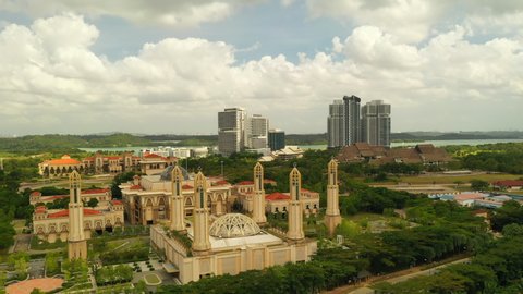 Aerial Cinematic Orbiting Kota Iskandar Johor State Mosque At Johor Bahru District With Beautiful Sky And Cloud 4K Footage