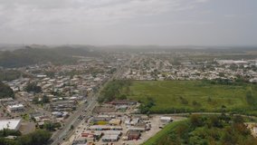 Aerial establishing shot of a residential area in Puerto Rico. Cinematic 4K footage.