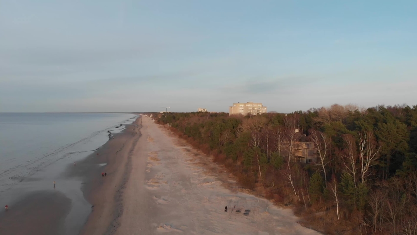 aerial view from a quadrocopter on the autumn beach and sea Royalty-Free Stock Footage #1047461527