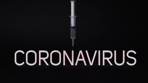 Syringe injects in the coronavirus inscription