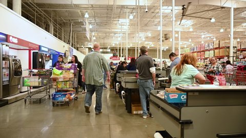 January 20, 2020 - San Diego California - Shoppers pay for their items at the checkout-line at Costco Wholesale