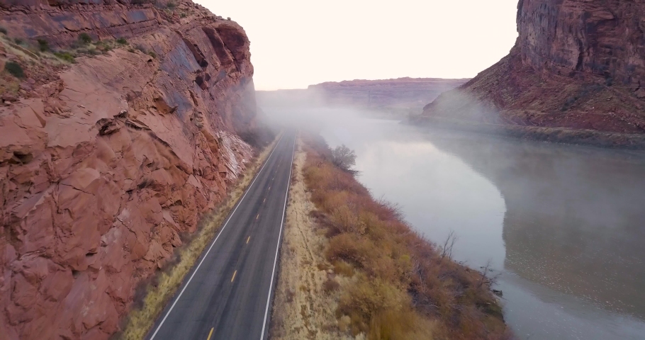 Aerial view of the Colorado River with morning fog near Moab, UT.