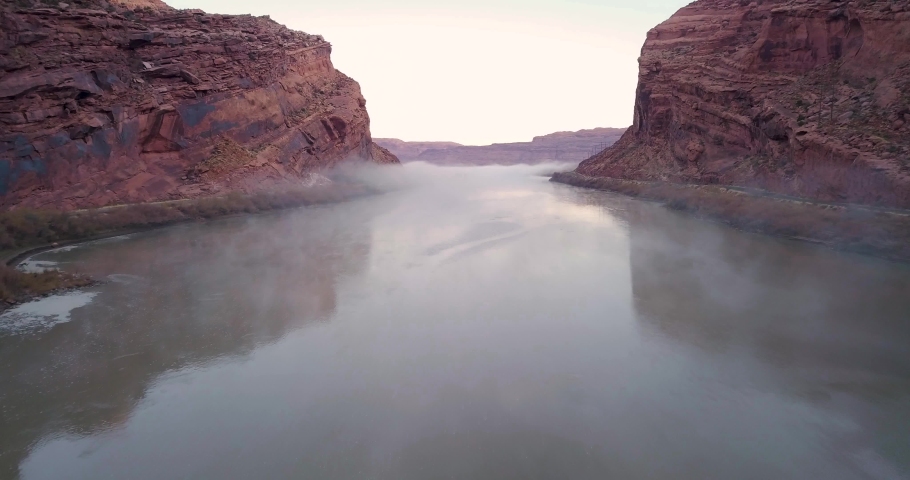Aerial view of the Colorado River with morning fog near Moab, UT.