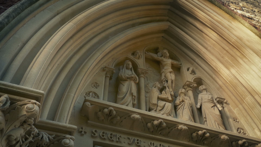 Carving Of Jesus On The Cross Above A Church Door