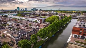 Utrecht city from top. General view from old tower at summer evening. 4K Time Lapse 2 in 1.