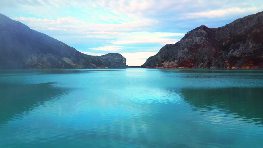 Aerial view of mountain Kawah Ijen volcano with blue acid lake. East Java, Indonesia