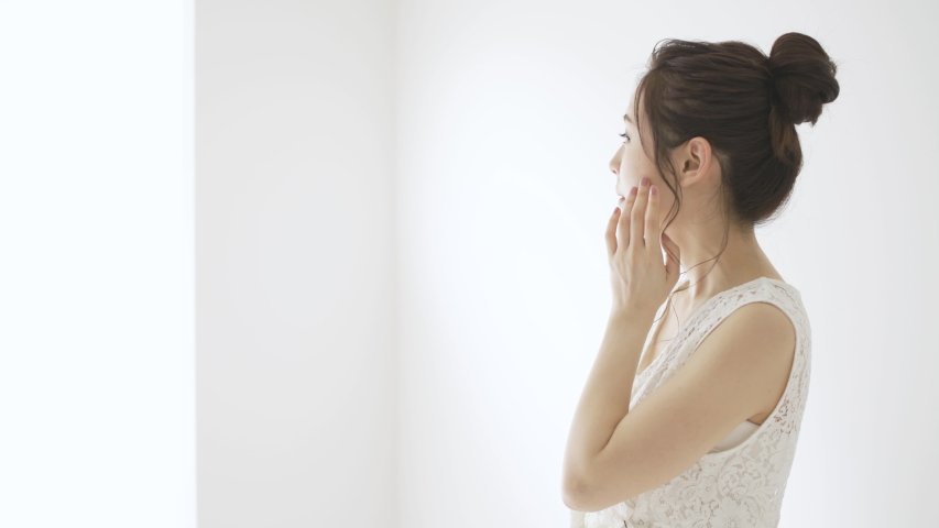 Young woman doing skin care