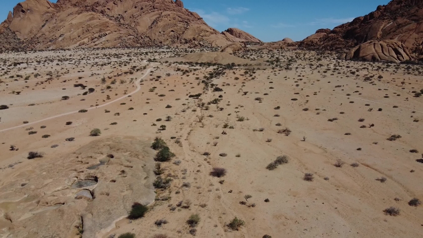 Aerial footage of a huge rocky mountain in Erongo region of Namibia, Go Everywhere