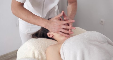 Spanish head massage. relaxing massage for face Massage therapist at Spa salon.