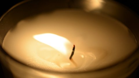 Single Candle Flame close hd stock footage