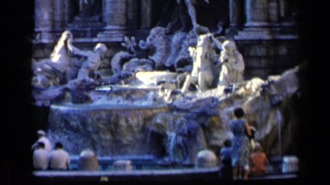 VATICAN ITALY-1960: Woman Looking At Fountain With Two Children Others Beside Her