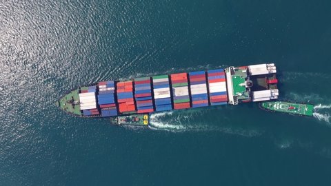 Aerial view cargo ship of business logistic transportation sea freight,Cargo ship, Cargo container in factory harbor at industrial estate for import export around in the world, Trade Port / Shipping 