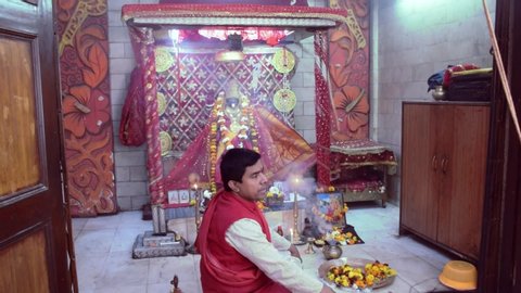 Delhi - India 22nd Feb 2020 
A Hindu priest or purohit performing Goddess Kali Puja in an Indian temple or mandir