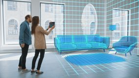 Decorating Apartment: Lovely Young Couple Use Digital Tablet with Augmented Reality Interior Design Software to Choose 3D Furniture for their Home. People Pick Sofa, Table and Lamp for Living Room - Powered by Shutterstock - Get 15% off with code: PIKWIZARD15