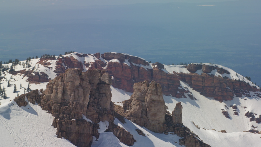 The snowcapped peaks and sheer cliffs of the Grand Teton mountains in Grand Teton National Park