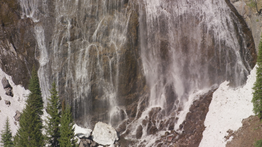 Ouzel Falls cascade down a dramatic rock formation on Ouzel Creek, in Yellowstone National Park