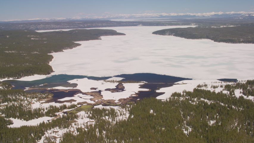 The partially frozen shoreline of Yellowstone Lake in Yellowstone National Park