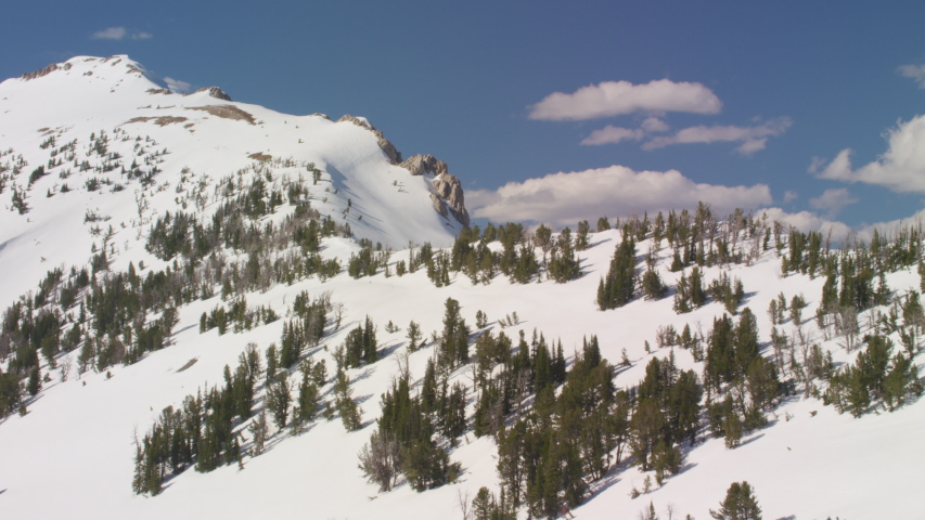 The snowcapped peaks of the Madison mountain Range between Yellowstone National Park and Bozeman, Montana
